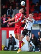 24 June 2022; Sean Boyd of Shelbourne in action against Lewis Macari of Dundalk during the SSE Airtricity League Premier Division match between Shelbourne and Dundalk at Tolka Park in Dublin. Photo by Michael P Ryan/Sportsfile