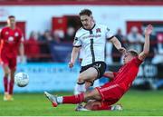 24 June 2022; John Martin of Dundalk in action against Brian McManus of Shelbourne during the SSE Airtricity League Premier Division match between Shelbourne and Dundalk at Tolka Park in Dublin. Photo by Michael P Ryan/Sportsfile