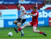 24 June 2022; Lewis Macari of Dundalk in action against Kameron Ledwidge of Shelbourne during the SSE Airtricity League Premier Division match between Shelbourne and Dundalk at Tolka Park in Dublin. Photo by Michael P Ryan/Sportsfile