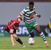24 June 2022; Aidomo Emakhu of Shamrock Rovers is tackled by Max Murphy of Bohemians during the SSE Airtricity League Premier Division match between Shamrock Rovers and Bohemians at Tallaght Stadium in Dublin. Photo by Ramsey Cardy/Sportsfile