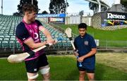 25 June 2022; Ryan Baird shows De La Salle college student Pesamino Ah Tong Sefo how to hold a hurley after Ireland rugby squad training at North Harbour Stadium in Auckland, New Zealand. Photo by Brendan Moran/Sportsfile