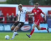 24 June 2022; Greg Sloggett of Dundalk in action against JJ Lunney of Shelbourne during the SSE Airtricity League Premier Division match between Shelbourne and Dundalk at Tolka Park in Dublin. Photo by Michael P Ryan/Sportsfile