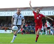 24 June 2022; Mark Connolly of Dundalk in action against Aaron O'Driscoll of Shelbourne during the SSE Airtricity League Premier Division match between Shelbourne and Dundalk at Tolka Park in Dublin. Photo by Michael P Ryan/Sportsfile