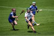 25 June 2022; Clódach De Burca of Athenry in action against Eimear O'Callaghan of Killeedy during the John West Féile na nGael National Camogie and Hurling Finals, 2022 at the GAA National Games Development Centre Campus, Abbotstown today. Eighty club sides from Ireland, the UK, Europe and US competed in the final stages of the under-15 competition across 10 venues in Dublin and Meath. Sponsored for the seventh time by John West, it is one of the biggest underage sporting events on the continent. Photo by David Fitzgerald/Sportsfile