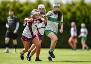 25 June 2022; Eimear Murray of Swatragh, Derry, in action against Laoise McCollam of Ruairí Óg Cushendall, Antrim, during the John West Féile na nGael National Camogie and Hurling Finals at Kiltale GAA in Meath. Photo by Daire Brennan/Sportsfile