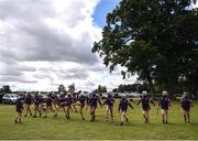 25 June 2022; The Ruairí Óg Cushendall, Antrim, team warm-up ahead of the John West Féile na nGael National Camogie and Hurling Finals at Kiltale GAA in Meath. Photo by Daire Brennan/Sportsfile