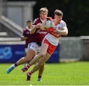 25 June 2022; Ruarí Forbes of Derry in action against Jack Lonergan of Galway during the Electric Ireland GAA All-Ireland Football Minor Championship Semi-Final match between Galway and Derry at Parnell Park, Dublin. Photo by Ray McManus/Sportsfile