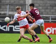 25 June 2022; Ruarí Forbes of Derry in action against Shay McGlinchey of Galway during the Electric Ireland GAA All-Ireland Football Minor Championship Semi-Final match between Galway and Derry at Parnell Park, Dublin. Photo by Ray McManus/Sportsfile