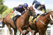 25 June 2022; Teresa Mendoza, with Billy Lee up, on their way to winning The Dubai Duty Free Dash Stakes from second place Prisoner's Dilemma with Donagh O'Connor during the Dubai Duty Free Irish Derby Festival at The Curragh Racecourse in Kildare. Photo by Matt Browne/Sportsfile