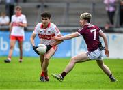 25 June 2022; Conal Higgins of Derry in action against Ross Coen of Galway during the Electric Ireland GAA All-Ireland Football Minor Championship Semi-Final match between Galway and Derry at Parnell Park, Dublin. Photo by Ray McManus/Sportsfile