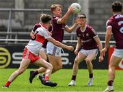 25 June 2022; Ryan Flaherty of Galway wins possession ahead of his team mates and Eóin Higgins of Derry during the Electric Ireland GAA All-Ireland Football Minor Championship Semi-Final match between Galway and Derry at Parnell Park, Dublin. Photo by Ray McManus/Sportsfile
