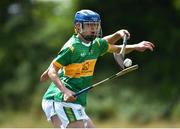 25 June 2022; Alfie Hughes of Castleblayney, Monaghan, in action against Matthew Cox of London during the John West Féile na nGael National Camogie and Hurling Finals at Meath GAA Centre  Dunganny in Meath. Photo by Daire Brennan/Sportsfile