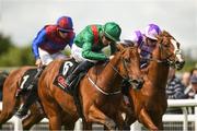 25 June 2022; Shartash,6, with Ben Coen up, on their way to winning The GAIN Railway Stakes during the Dubai Duty Free Irish Derby Festival at The Curragh Racecourse in Kildare. Photo by Matt Browne/Sportsfile