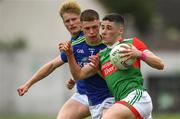 25 June 2022; Paul Gilmore of Mayo in action against Fionn Murphy of Kerry during the Electric Ireland GAA All-Ireland Football Minor Championship Semi-Final match between Mayo and Kerry at O'Connor Park in Tullamore, Offaly. Photo by George Tewkesbury/Sportsfile