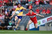 25 June 2022; Cathal O'Connor of Clare in action against Pádraig McGrogan of Derry during the GAA Football All-Ireland Senior Championship Quarter-Final match between Clare and Derry at Croke Park, Dublin. Photo by David Fitzgerald/Sportsfile