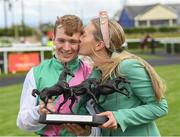 25 June 2022; Colin Keane with his girlfriend Kerri Lyons after winning The Dubai Duty Free Irish Derby on Westover during the Dubai Duty Free Irish Derby Festival at The Curragh Racecourse in Kildare. Photo by Matt Browne/Sportsfile