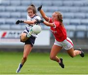 25 June 2022; Katie Murray of Waterford has her shot blocked by Sarah Leahy of Cork during the TG4 All-Ireland SFC Group D Round 3 fixture between Cork and Waterford at MW Hire O’Moore Park in Portlaoise, Co Laois. Photo by Michael P Ryan/Sportsfile