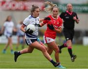 25 June 2022; Kellyann Hogan of Waterford in action against Laura O'Mahony of Cork during the TG4 All-Ireland SFC Group D Round 3 match at MW Hire O’Moore Park in Portlaoise, Co Laois. Photo by Michael P Ryan/Sportsfile