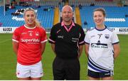 25 June 2022; Referee Jonathan Murphy with team captains Maire O'Callaghan of Cork, left, and Karen McGrath of Waterford during the TG4 All-Ireland SFC Group D Round 3 match at MW Hire O’Moore Park in Portlaoise, Co Laois. Photo by Michael P Ryan/Sportsfile
