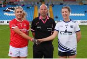 25 June 2022; Referee Jonathan Murphy with team captains Maire O'Callaghan of Cork, left, and Karen McGrath of Waterford during the TG4 All-Ireland SFC Group D Round 3 match at MW Hire O’Moore Park in Portlaoise, Co Laois. Photo by Michael P Ryan/Sportsfile