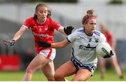 25 June 2022; Kate McGrath of Waterford in action against Melissa Duggan of Cork during the TG4 All-Ireland SFC Group D Round 3 match at MW Hire O’Moore Park in Portlaoise, Co Laois. Photo by Michael P Ryan/Sportsfile