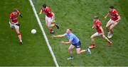 25 June 2022; Ciarán Kilkenny of Dublin in action against Cork players, left to right, Ian Maguire, Eoghan McSweeney, John Cooper, and Rory Maguire during the GAA Football All-Ireland Senior Championship Quarter-Final match between Dublin and Cork at Croke Park, Dublin. Photo by Daire Brennan/Sportsfile