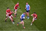 25 June 2022; Dean Rock of Dublin in action against Cork players, left to right, Maurice Shanley, Brian Hurley, Mattie Taylor, and Rory Maguire during the GAA Football All-Ireland Senior Championship Quarter-Final match between Dublin and Cork at Croke Park, Dublin. Photo by Daire Brennan/Sportsfile