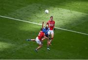 25 June 2022; Niall Scully of Dublin catches the ball ahead of Seán Powter of Cork during the GAA Football All-Ireland Senior Championship Quarter-Final match between Dublin and Cork at Croke Park, Dublin. Photo by Daire Brennan/Sportsfile