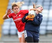 25 June 2022; Libby Coppinger of Cork in action against Waterford goalkeeper Katie O'Hanlon during the TG4 All-Ireland SFC Group D Round 3 fixture between Cork and Waterford at MW Hire O’Moore Park in Portlaoise, Co. Laois. Photo by Michael P Ryan/Sportsfile