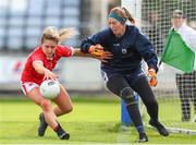 25 June 2022; Libby Coppinger of Cork in action against Waterford goalkeeper Katie O'Hanlon during the TG4 All-Ireland SFC Group D Round 3 fixture between Cork and Waterford at MW Hire O’Moore Park in Portlaoise, Co. Laois. Photo by Michael P Ryan/Sportsfile