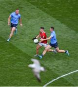 25 June 2022; Seán Powter of Cork in action against Cormac Costello of Dublin during the GAA Football All-Ireland Senior Championship Quarter-Final match between Dublin and Cork at Croke Park, Dublin. Photo by Daire Brennan/Sportsfile