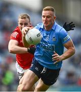 25 June 2022; Ciarán Kilkenny of Dublin in action against Mattie Taylor of Cork during the GAA Football All-Ireland Senior Championship Quarter-Final match between Dublin and Cork at Croke Park, Dublin. Photo by David Fitzgerald/Sportsfile