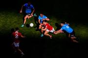 25 June 2022; Kevin O'Donovan of Cork in action against Dublin players, left to right, Cormac Costello, Niall Scully, and Brian Fenton during the GAA Football All-Ireland Senior Championship Quarter-Final match between Dublin and Cork at Croke Park, Dublin. Photo by Daire Brennan/Sportsfile