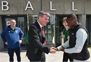 25 June 2022; Republic of Ireland manager Stephen Kenny, left, shakes hands with Inza Bamba during a Republic of Ireland Refugee Team meet and greet at FAI Headquarters in Abbotstown, Dublin. Photo by Sam Barnes/Sportsfile