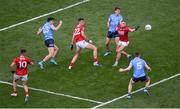 25 June 2022; Brian Hurley of Cork reaches for the ball ahead of Dublin players, Eoghan O'Donnell, Michael Fitzsimons, and John Small during the GAA Football All-Ireland Senior Championship Quarter-Final match between Dublin and Cork at Croke Park, Dublin. Photo by Daire Brennan/Sportsfile