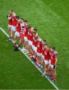 25 June 2022; The Cork team stand together for the national anthem ahead of the GAA Football All-Ireland Senior Championship Quarter-Final match between Dublin and Cork at Croke Park, Dublin. Photo by Daire Brennan/Sportsfile