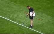 25 June 2022; Croke Park Pitch Manager Stuart Wilson does some work on the pitch ahead of the GAA Football All-Ireland Senior Championship Quarter-Final match between Dublin and Cork at Croke Park, Dublin. Photo by Daire Brennan/Sportsfile