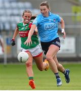 25 June 2022; Jennifer Dunne of Dublin in action against Tara Needham of Mayo during the TG4 All-Ireland SFC Group A Round 3 match between Dublin and Mayo at MW Hire O’Moore Park in Portlaoise, Co Laois. Photo by Michael P Ryan/Sportsfile