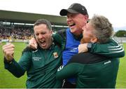 25 June 2022; Mayo manager Seán Deane, centre, celebrates aith seletors Danny O'Toole, left, and Shane McCann after the Electric Ireland GAA All-Ireland Football Minor Championship Semi-Final match between Mayo and Kerry at O'Connor Park in Tullamore, Offaly. Photo by George Tewkesbury/Sportsfile