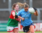 25 June 2022; Kate McDaid of Dublin  in action against Sarah Mulvihill of Mayo during the TG4 All-Ireland SFC Group A Round 3 match between Dublin and Mayo at MW Hire O’Moore Park in Portlaoise, Co Laois. Photo by Michael P Ryan/Sportsfile