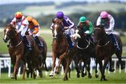 26 June 2022; Proud And Regal, with Killian Leonard up, centre, on their way to winning the Barronstown Stud Irish EBF Maiden during day three of the Dubai Duty Free Irish Derby Festival at The Curragh Racecourse in Kildare. Photo by David Fitzgerald/Sportsfile