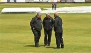 26 June 2022; Umpires, from left, Phil Thompson, George Brolly and Azam Ali Baig inspect the grounds before the Cricket Ireland Inter-Provincial Trophy match between Dragons and Scorchers at Waringstown Cricket Club in Craigavon, Armagh. Photo by Oliver McVeigh/Sportsfile