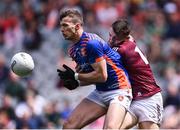 26 June 2022; Armagh goalkeeper Ethan Rafferty beats Damien Comer of Galway to the ball during the GAA Football All-Ireland Senior Championship Quarter-Final match between Armagh and Galway at Croke Park, Dublin. Photo by Piaras Ó Mídheach/Sportsfile
