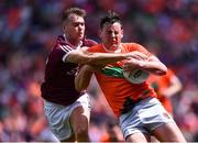 26 June 2022; Aaron McKay of Armagh in action against Robert Finnerty of Galway during the GAA Football All-Ireland Senior Championship Quarter-Final match between Armagh and Galway at Croke Park, Dublin. Photo by Piaras Ó Mídheach/Sportsfile