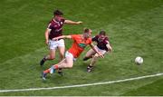 26 June 2022; Rian O'Neill of Armagh in action against Seán Kelly, left, and Jack Glynn of Galway during the GAA Football All-Ireland Senior Championship Quarter-Final match between Armagh and Galway at Croke Park, Dublin. Photo by Daire Brennan/Sportsfile