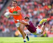 26 June 2022; Stefan Campbell of Armagh is tackled by Cillian McDaid of Galway during the GAA Football All-Ireland Senior Championship Quarter-Final match between Armagh and Galway at Croke Park, Dublin. Photo by Ray McManus/Sportsfile