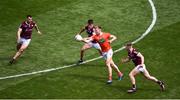 26 June 2022; Rian O'Neill of Armagh in action against Galway players, left to right, Liam Silke, Seán Kelly, and Dylan McHugh during the GAA Football All-Ireland Senior Championship Quarter-Final match between Armagh and Galway at Croke Park, Dublin. Photo by Daire Brennan/Sportsfile