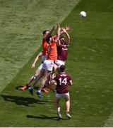 26 June 2022; Paul Conroy of Galway in action against Jarly Óg Burns, left, and Ben Crealey of Armagh during the GAA Football All-Ireland Senior Championship Quarter-Final match between Armagh and Galway at Croke Park, Dublin. Photo by Daire Brennan/Sportsfile