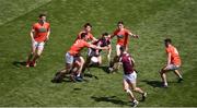 26 June 2022; Cillian McDaid of Galway in action against Armagh players, left to right, Aaron McKay, Ben Crealey, and Rory Grugan during the GAA Football All-Ireland Senior Championship Quarter-Final match between Armagh and Galway at Croke Park, Dublin. Photo by Daire Brennan/Sportsfile