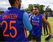 26 June 2022; India debutant Umran Malik is awarded his cap before the LevelUp11 First Men's T20 International match between Ireland and India at Malahide Cricket Club in Dublin. Photo by Ramsey Cardy/Sportsfile